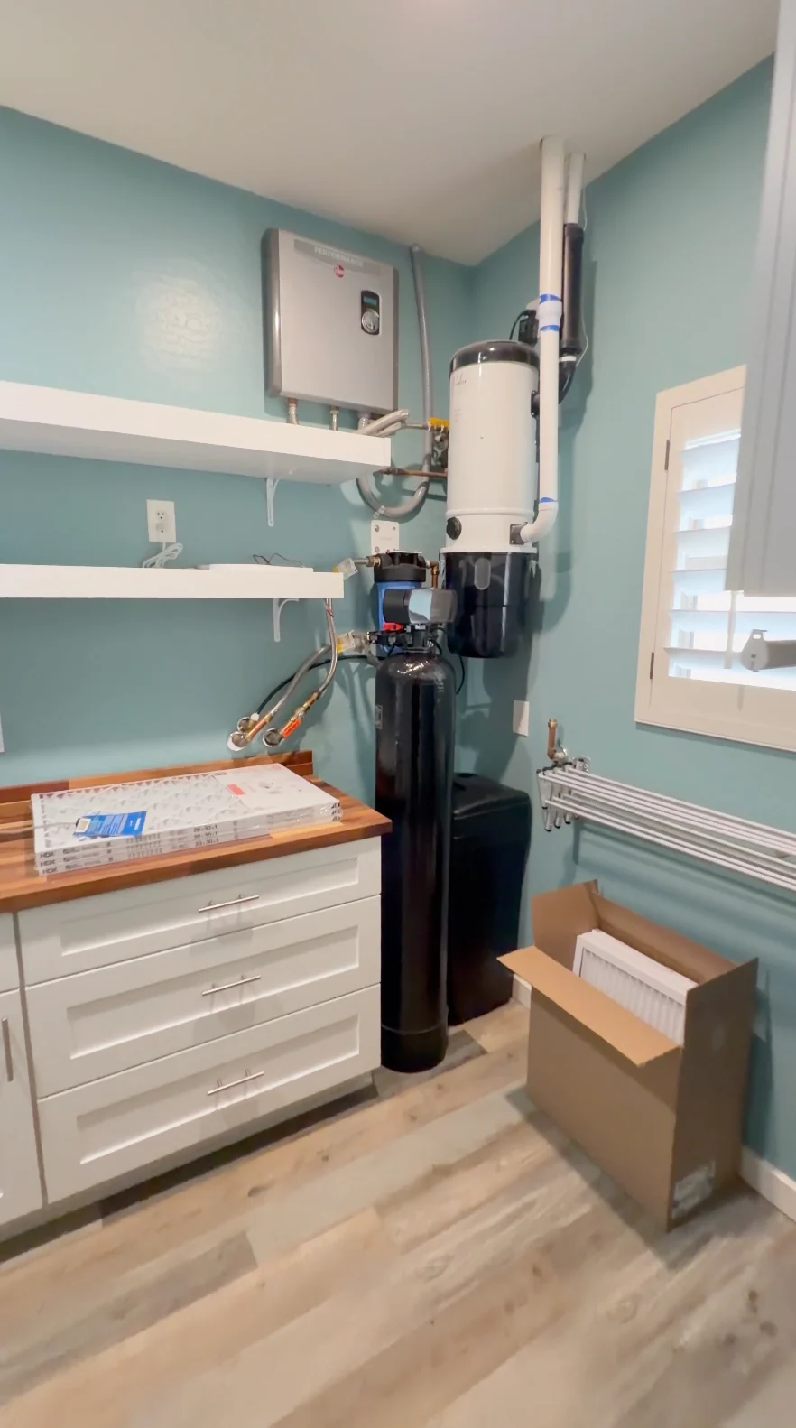 The failing water softener installation found in a Queen Creek AZ fixer-upper